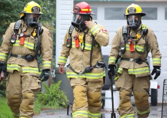 three Firefighters in bunker gear