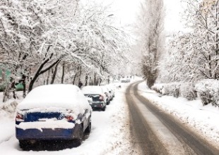 Car parked on snowy road