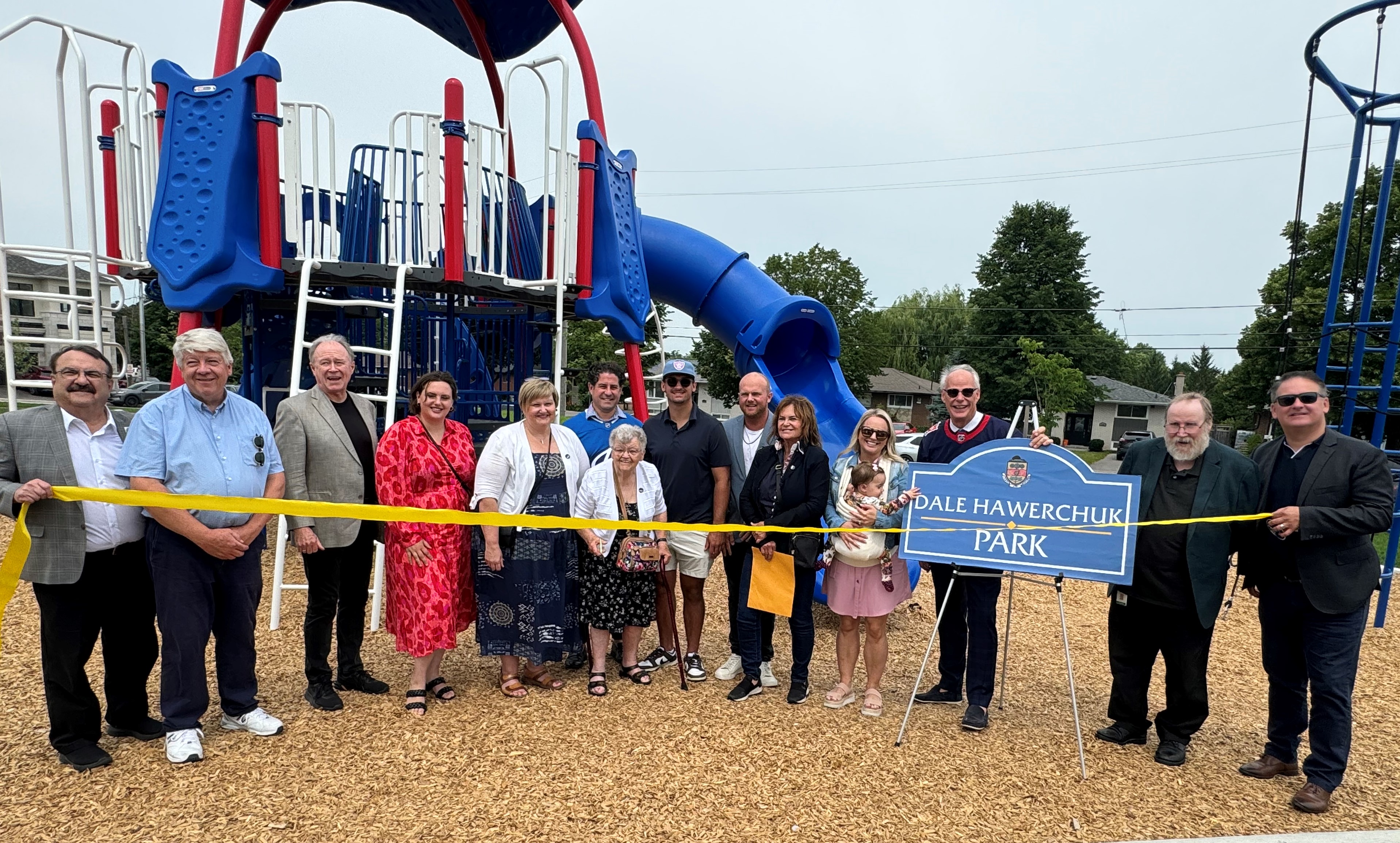 Members of Oshawa Council were joined by family of the late Dale Hawerchuk to celebrate the official opening of Dale Hawerchuk Park situated in the new Symphony Towns development on Harmony Road South, the former site of Donevan High School.