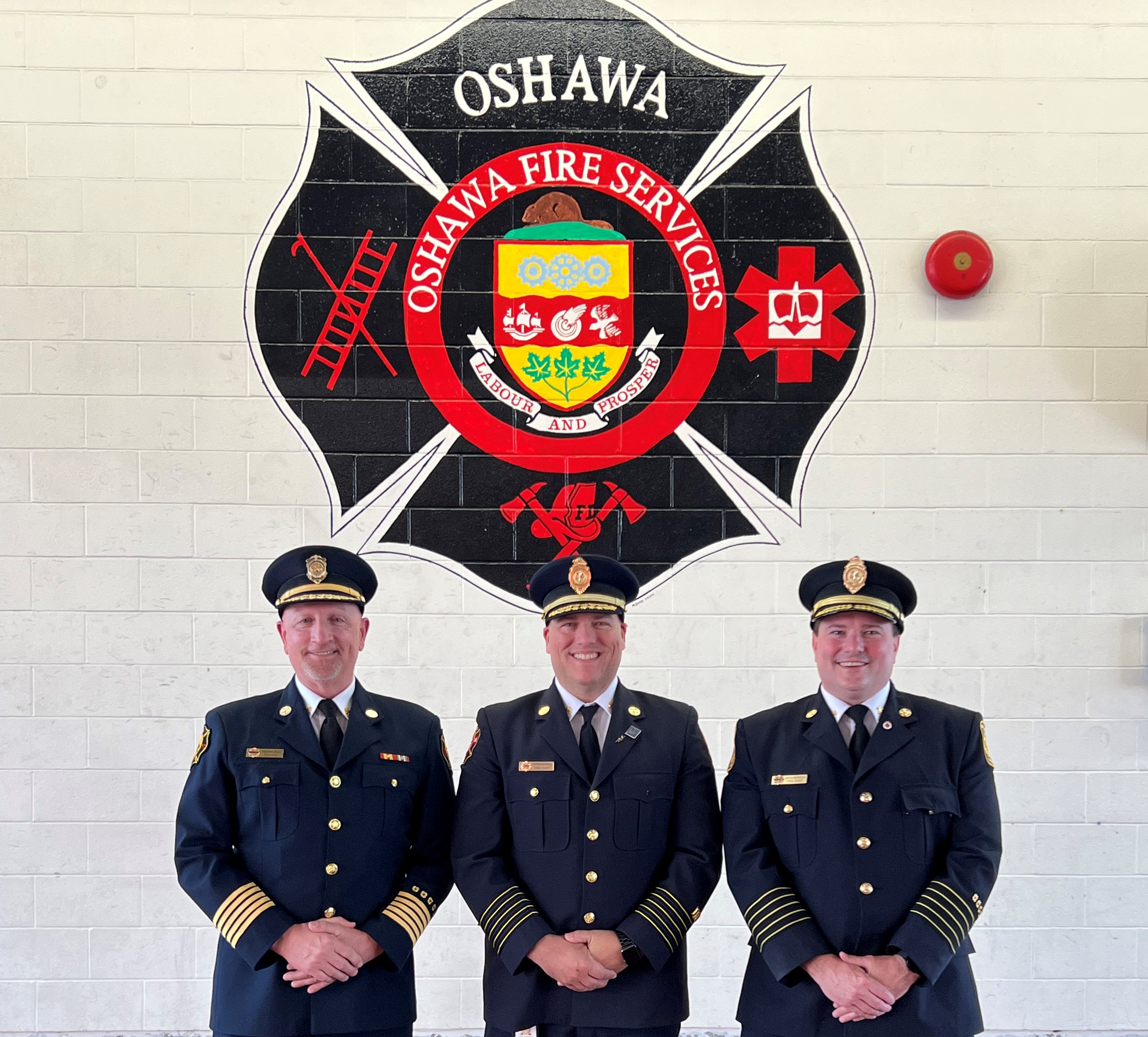 Pickering Fire Chief Stephen Boyd, Oshawa Fire Chief Stephen Barkwell and Ajax Fire Chief Aaron Burridge together at Oshawa Fire Station 1 Headquarters. The three fire services recently consolidated their dispatch operations.  