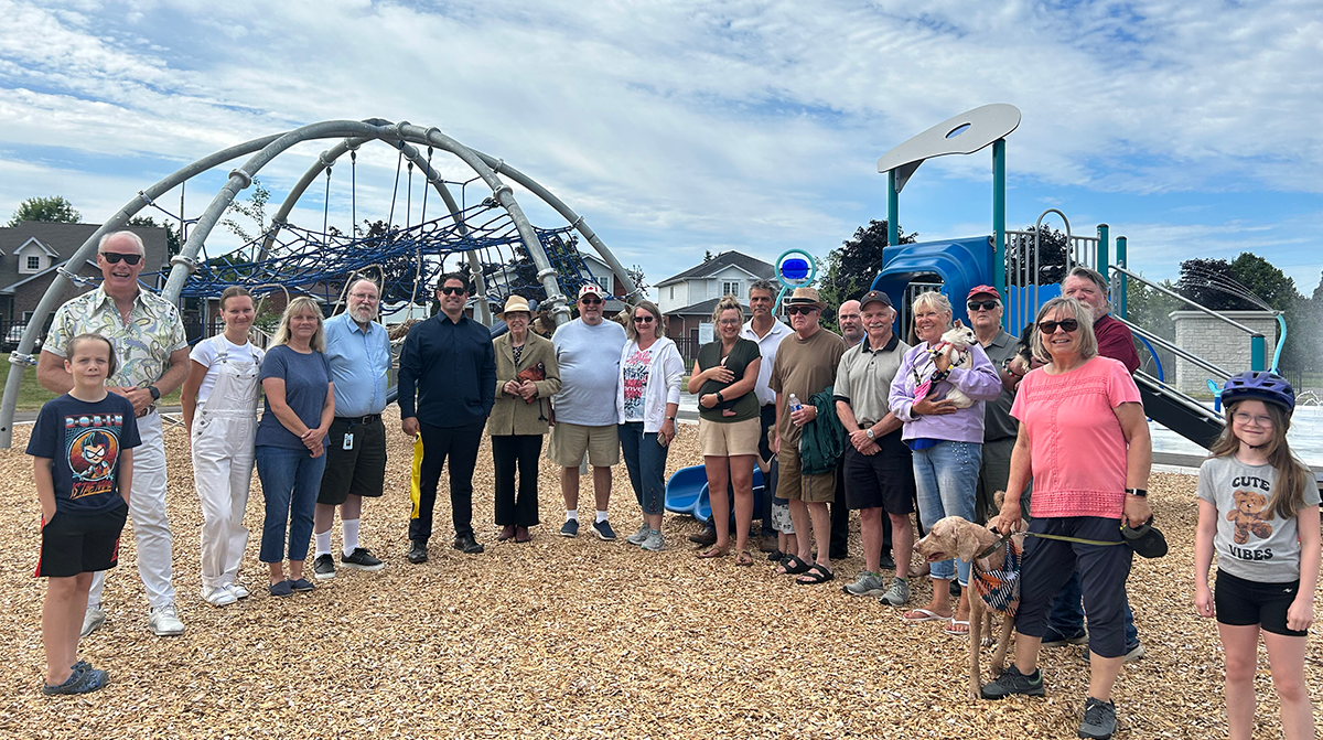 Members of Oshawa City Council and neighbhourhood residents celebrated the re-opening of Deer Valley Park and its new splash pad at a ribbon-cutting ceremony.