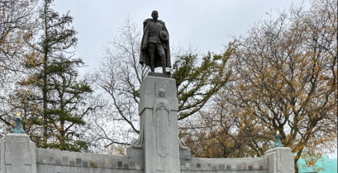 Cenotaph at Memorial Park - sculpture of a warrior above two columns with the names of those lost