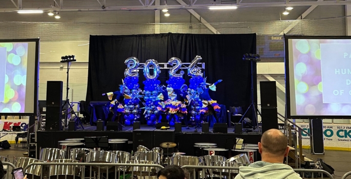 steel pan drums, stage with balloons