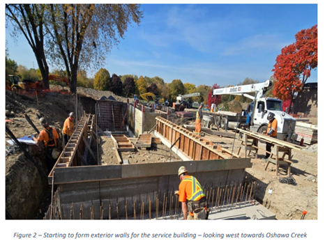 Starting to form exterior walls for the service building - looking west towards Oshawa Creek.