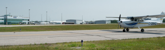 Plane taking off at the Oshawa Executive Airport