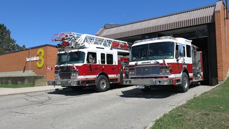 2 fire trucks in front of Fire Station 3